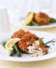 Salmon fritters with herbs and asparagus — Stock Photo