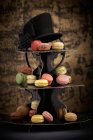 Macaroons on tiered cake stand — Stock Photo