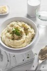 Mashed potato with herbs in bowl — Stock Photo
