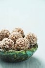 Chocolate truffles with coconut — Stock Photo