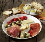 Plate of Mediterranean cheeses — Stock Photo