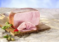 Partly sliced boiled ham — Stock Photo
