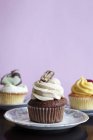 Trois cupcakes différents — Photo de stock