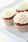 Three buttercream cupcakes — Stock Photo