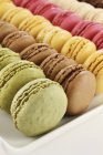 Rows of colorful macarons — Stock Photo