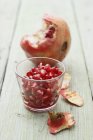 Pomegranate seeds in glass — Stock Photo