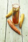 Pickled carrots in jar — Stock Photo