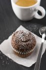 Chocolate muffin with cup of espresso — Stock Photo