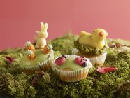 Muffins with marzipan decorations — Stock Photo