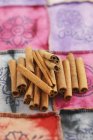 Cinnamon sticks on the napkin — Stock Photo