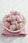 Rose sweet meringues in ceramic bowl — Stock Photo