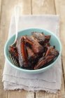 Roasted pork ribs in bowl — Stock Photo