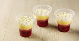 Closeup view of raspberry trifles in glasses — Stock Photo