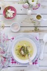 Asparagus soup with bread and cheese — Stock Photo