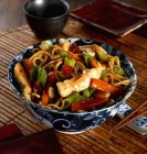 Spicy chicken with egg noodles — Stock Photo