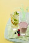 Berry smoothie and apple — Stock Photo