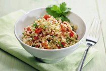 Tablouleh bulgur salad with tomatoes and parsley — Stock Photo