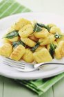 Closeup view of home-made Gnocchi with sage — Stock Photo