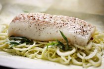 Raw cod fish fillet — Stock Photo