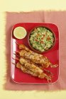 Chicken skewers with guacamole — Stock Photo