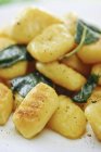 Closeup view of spiced Gnocchi with sage — Stock Photo