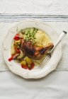 Chicken leg with couscous — Stock Photo