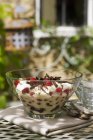 Closeup view of trifle with raspberries and grated chocolate — Stock Photo