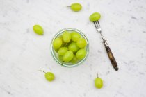 Green grapes in glass — Stock Photo