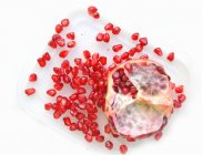 Sliced pomegranate with seeds — Stock Photo