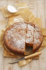 Carrot cake topped with icing sugar — Stock Photo