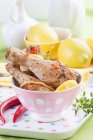 Baked chicken legs with lemon — Stock Photo