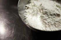Wheat flour in mixing bowl — Stock Photo