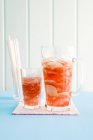 Iced tea in jug and glass — Stock Photo