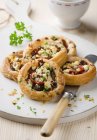 Puff pastry tartlets with tomato — Stock Photo