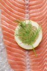 Salmon fillet with lemon and dill — Stock Photo