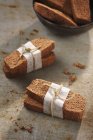 Financiers wrapped in pairs — Stock Photo
