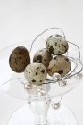 Quail eggs on tiered stand — Stock Photo