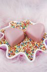 Love heart shaped chocolates — Stock Photo