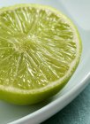 Half of fresh lime — Stock Photo