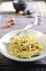 Tagliatelle pasta with sauce — Stock Photo