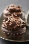 Cupcake with chocolate topping — Stock Photo