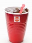 Cola with ice cubes in cup — Stock Photo