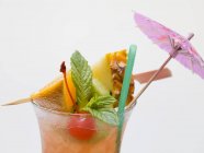Cocktail with exotic fruit — Stock Photo