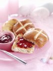 Hot cross buns with jam — Stock Photo