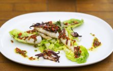 Grilled squid with vinaigrette — Stock Photo
