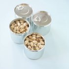 Unshelled Pistachios in tins — Stock Photo