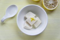 Bowl of tofu with juice — Stock Photo