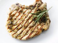 Grilled pork chop with rosemary — Stock Photo