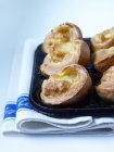 Yorkshire puddings in the baking tin — Stock Photo