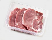 Pork neck steaks — Stock Photo